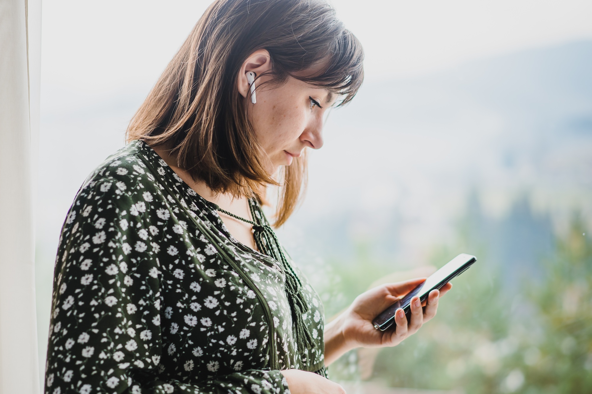 Woman using mobile device